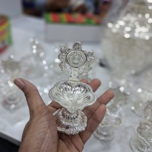 SHANKU OR CHAKRAM DIYA (20 PC PER BOX)— IMITATION GERMAN SILVER TRADITIONAL RETURN GIFTS